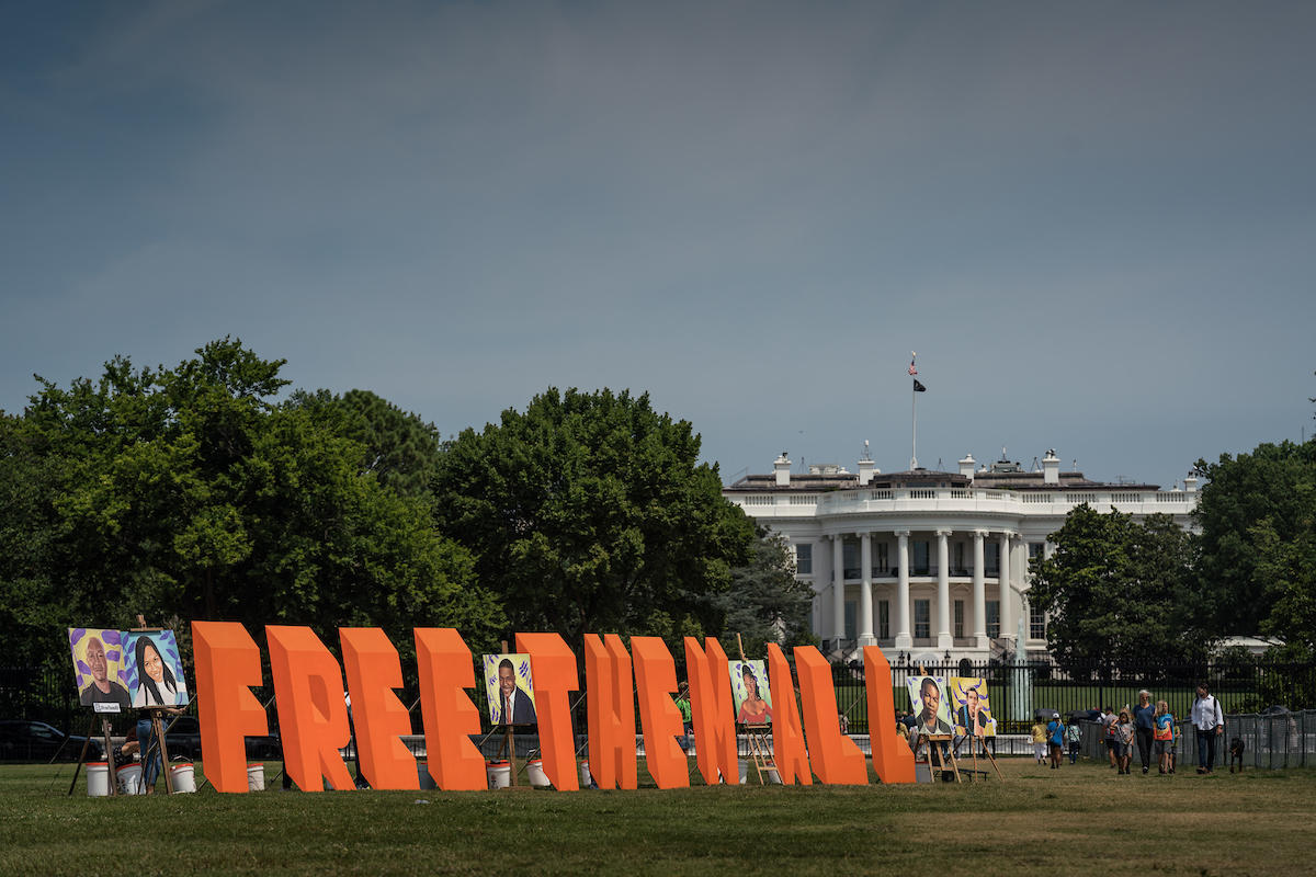 "Free Them All" display outside the White House
